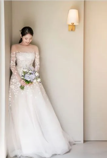 Mira bride wearing Maike gown