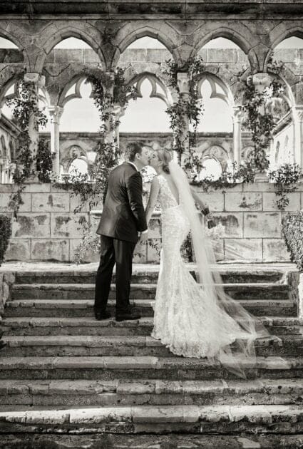 Mira bride wearing Veronica gown with matching veil