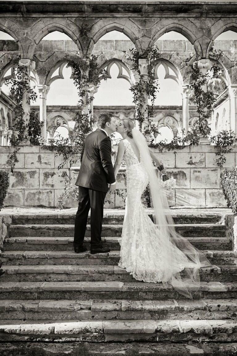 Mira bride wearing Veronica gown with matching veil
