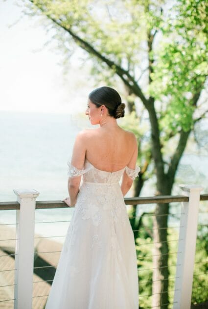 Gabrielle wearing Helena gown with matching cuffs