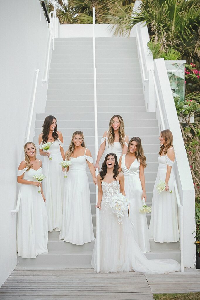 Mira bride with her bridesmaids in white