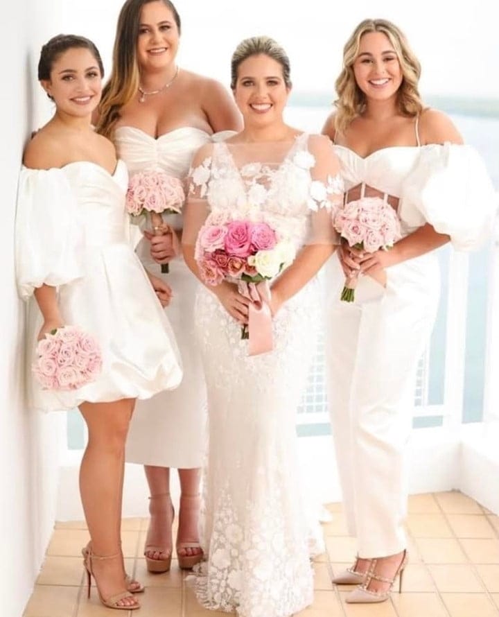 Mira bride with her bridesmaids in white