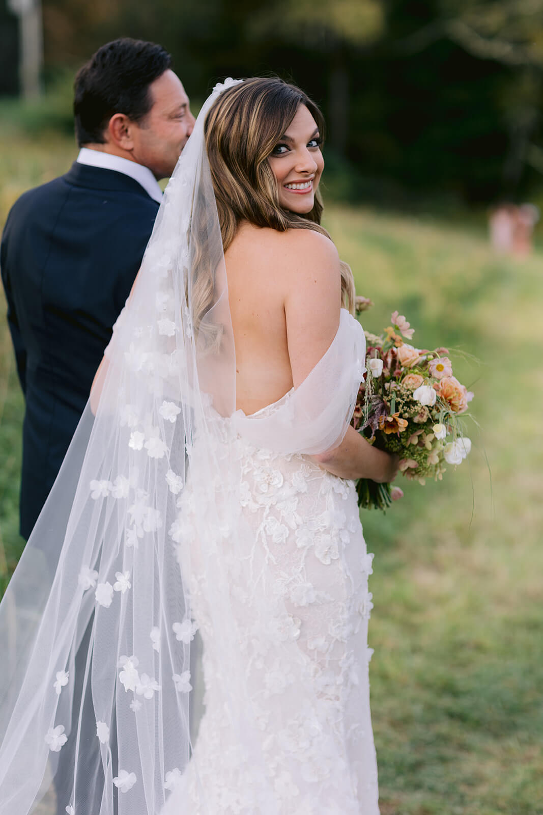 Chandler wearing Lulu gown & veil