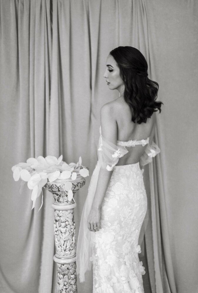 Rosanna wearing Mati gown & draped tulle sleeves