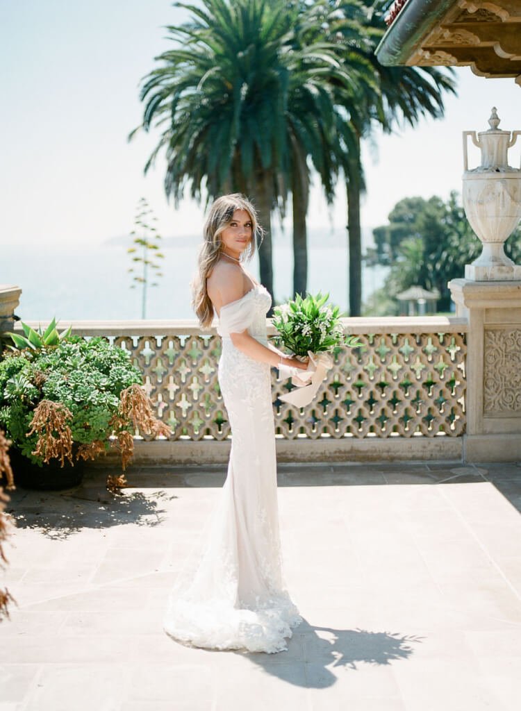 Mira bride wearing Chaz gown, draped sleeves & veil