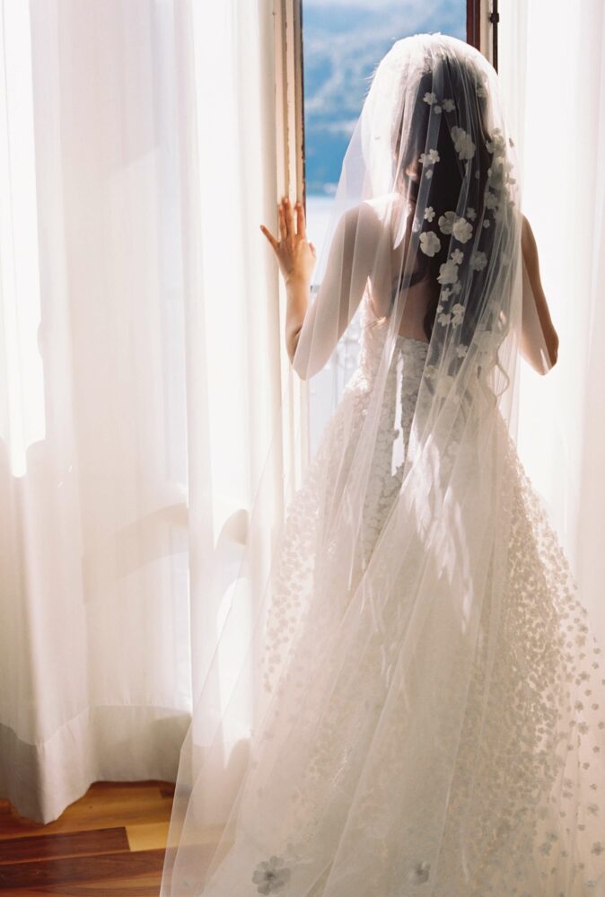 Anasasia wearing Gigi gown, cuffs & veil