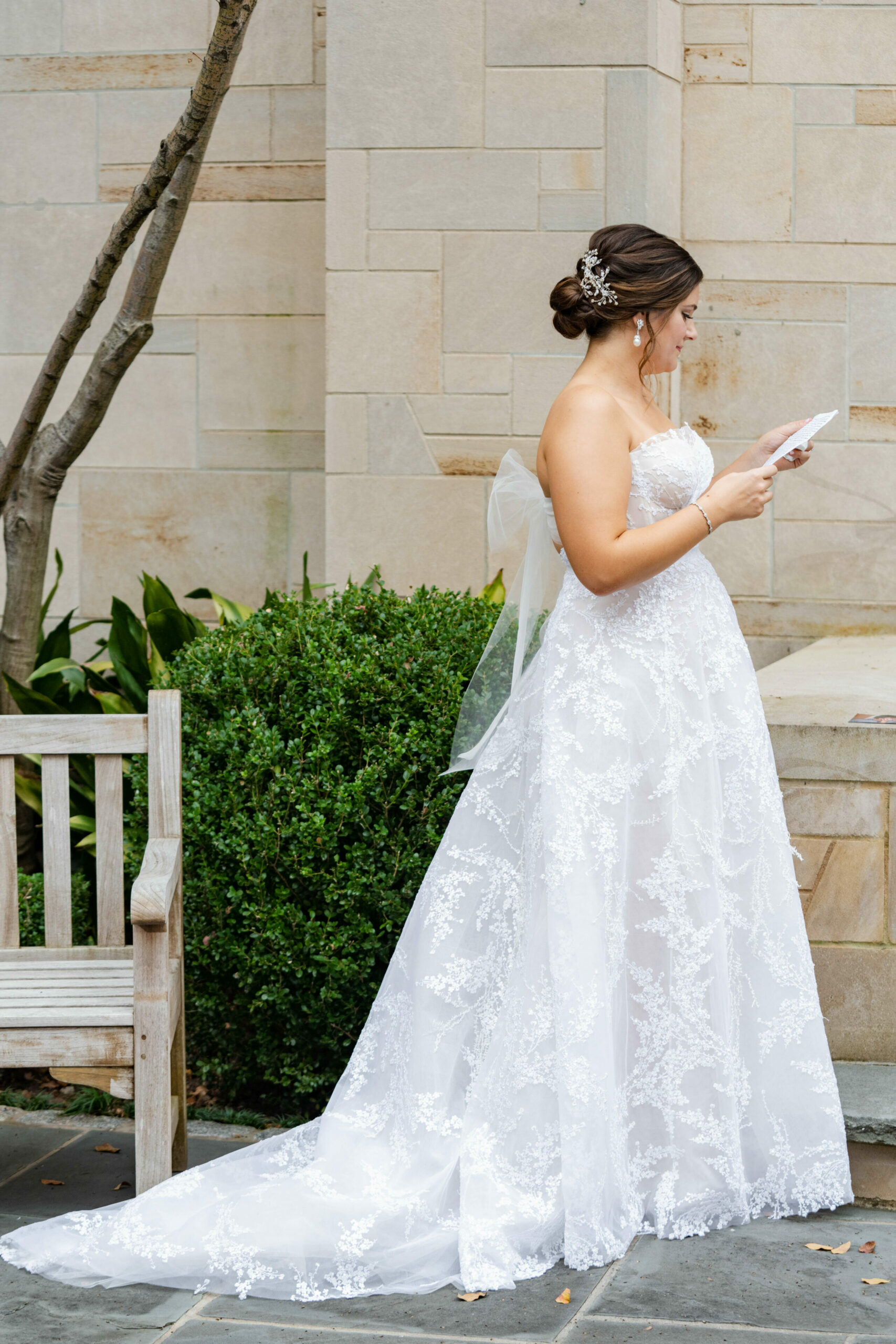 Anne Marie wearing Jamie gown, shrug & veil