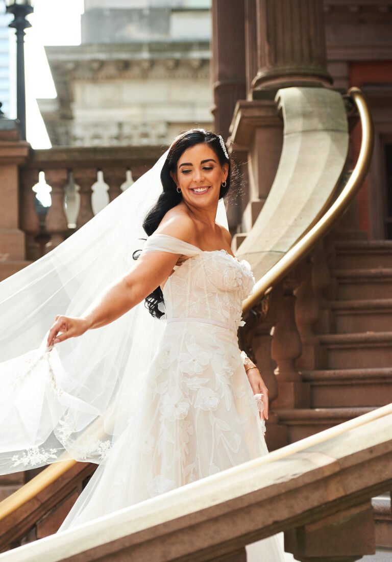 Jenna wearing Sallee gown & detachable draped sleeves
