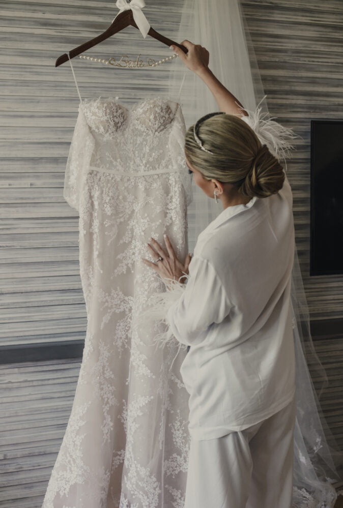 Maria wearing custom Jess gown with cuffs