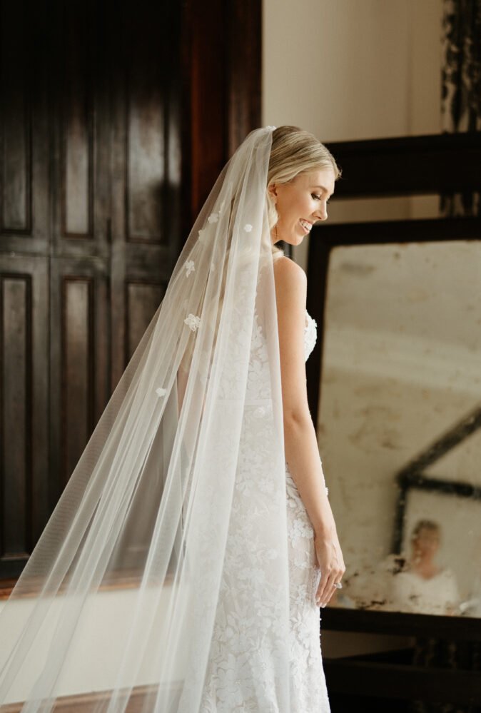 Kara Weigelt wearing Jona gown and matching veil