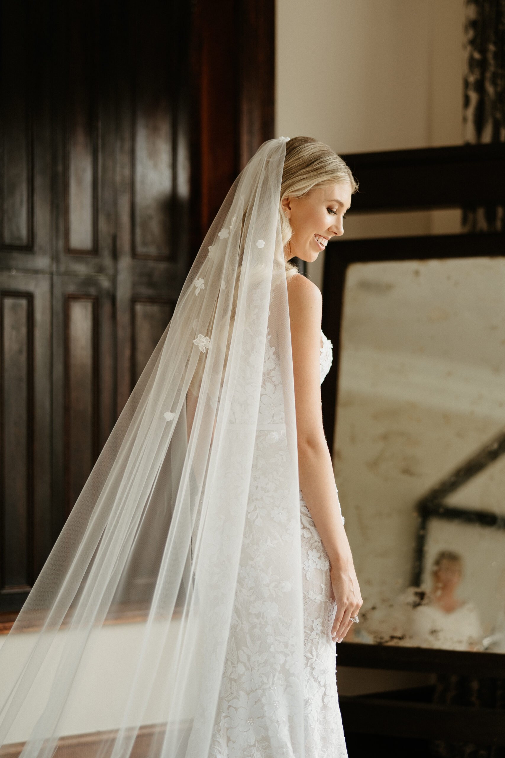 Kara Weigelt wearing Jona gown and matching veil