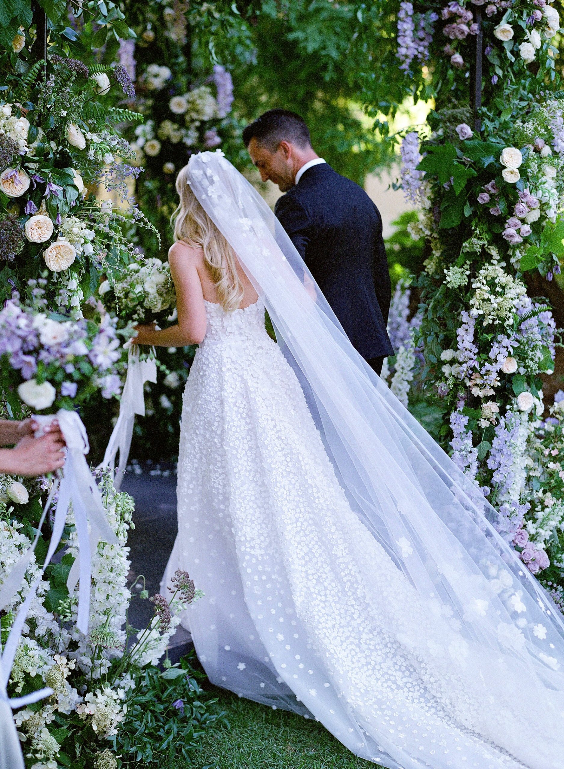 Kristen Burns wearing Gigi & Matching veil