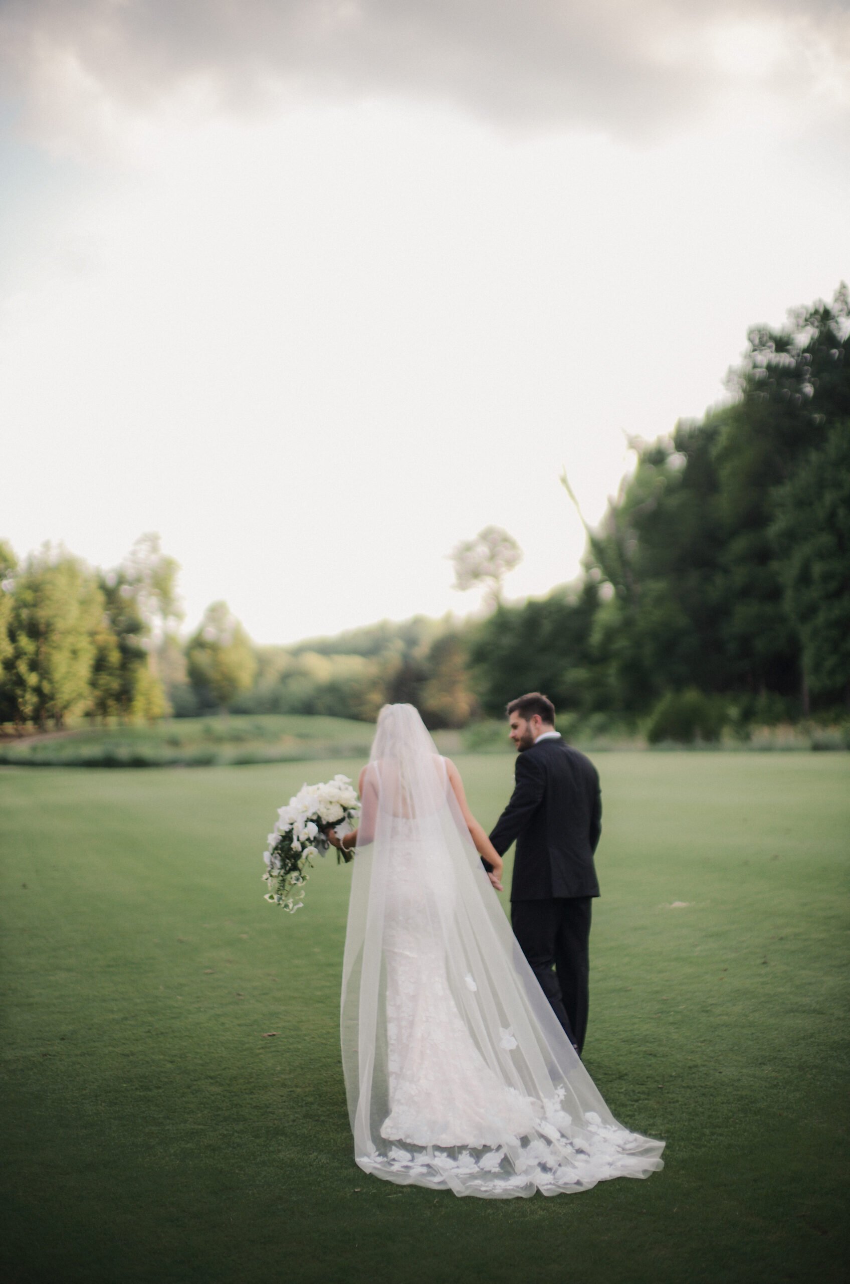 Andie Cape wearing Katya gown & matching veil