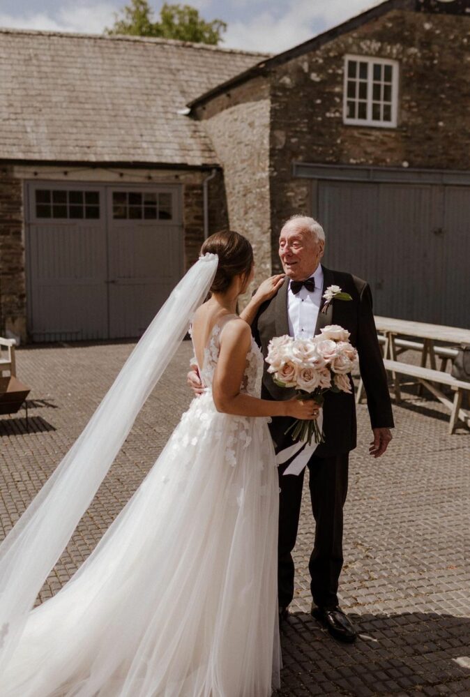 Danielle Betts wearing Ari gown & matching veil