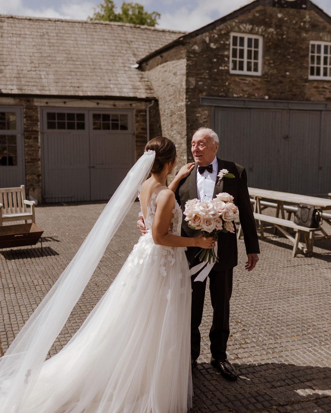 Danielle Betts wearing Ari gown & matching veil