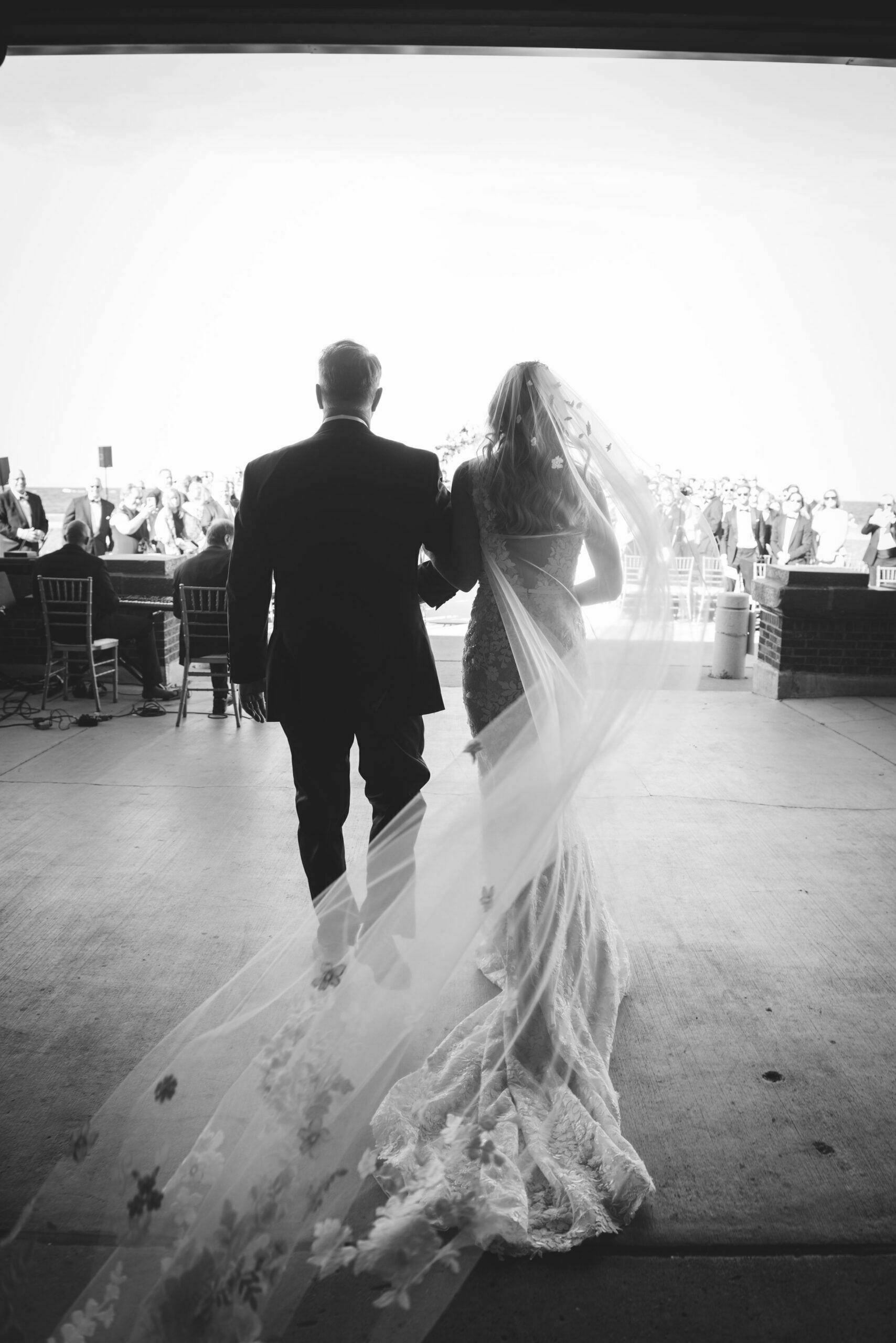 Kelly Ashmore wearing Jona gown and matching veil