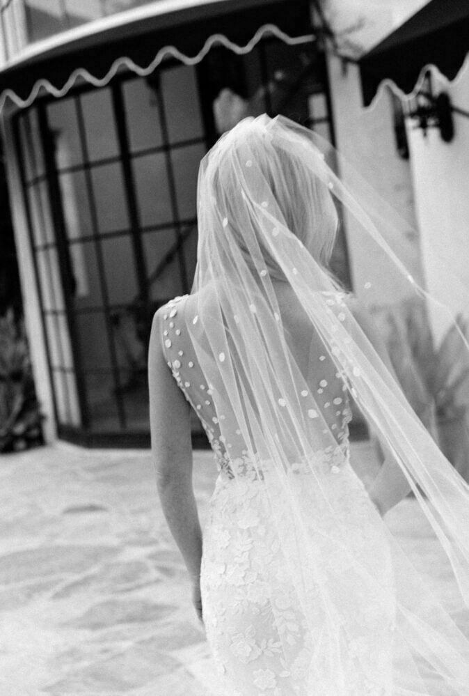 Ashley Poyer wearing Verona gown and matching veil