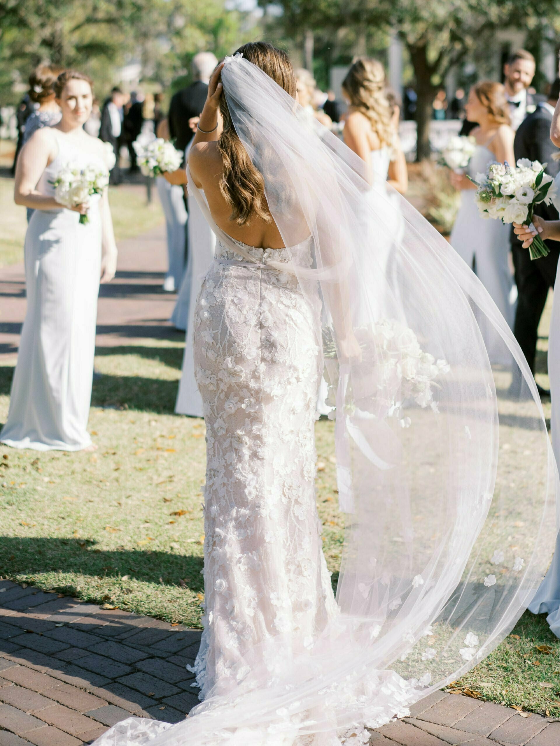 Kinley Meyer wearing Lulu gown and matching veil