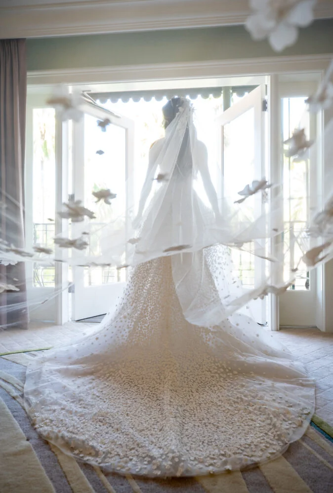 Ashley Asherian wearing Gigi gown and matching veil