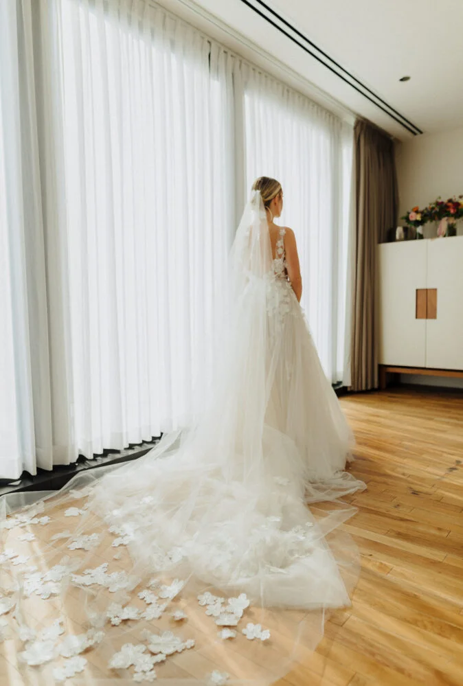 Kaitlyn Scavone wearing Ari gown and matching veil