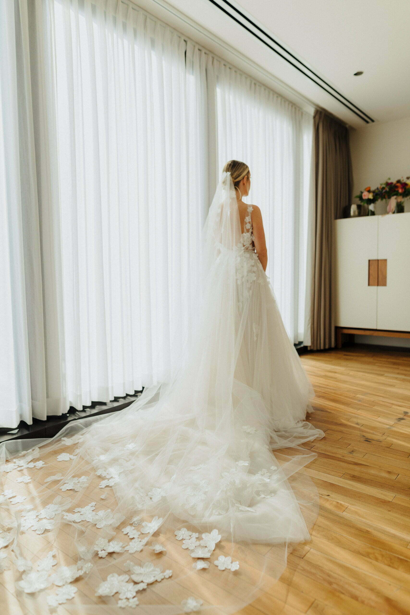 Kaitlyn Scavone wearing Ari gown and matching veil