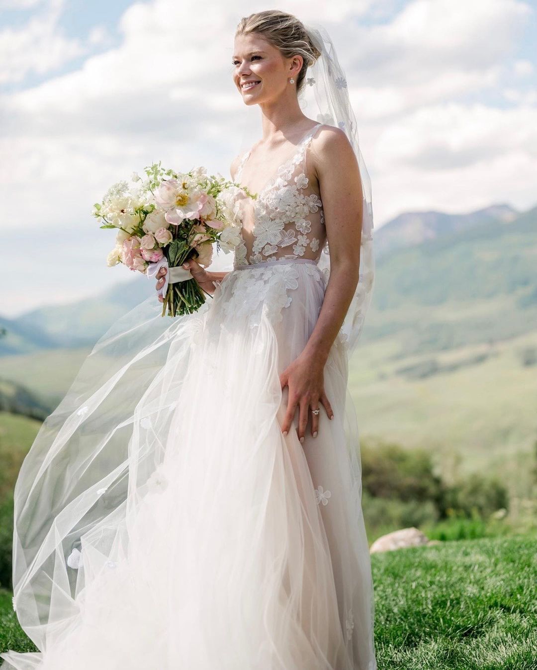 Lauren Mize wearing Ari gown and Ari veil