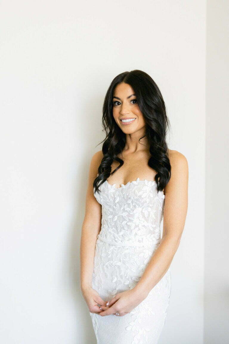 Julie Reiss wearing Chaz gown