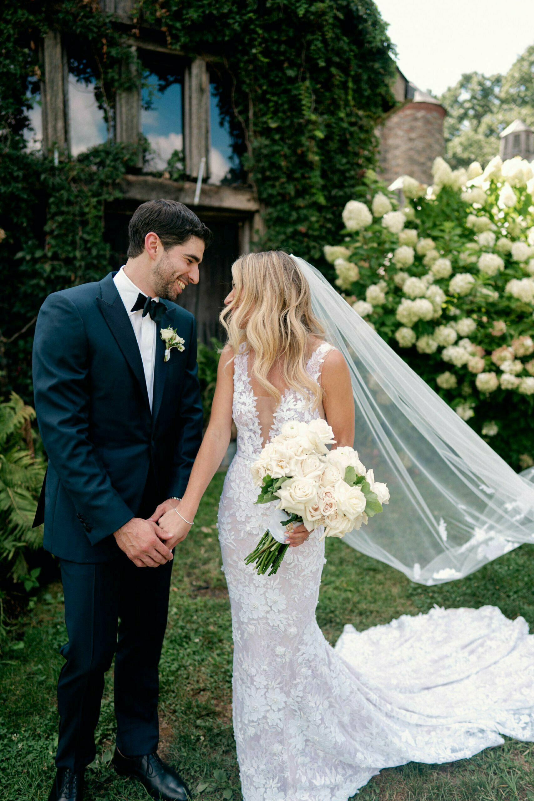 Sara Stein wearing Jona gown and Jona veil