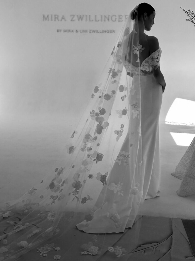 Bride in floral veil, soft light, Mira Zwillinger.