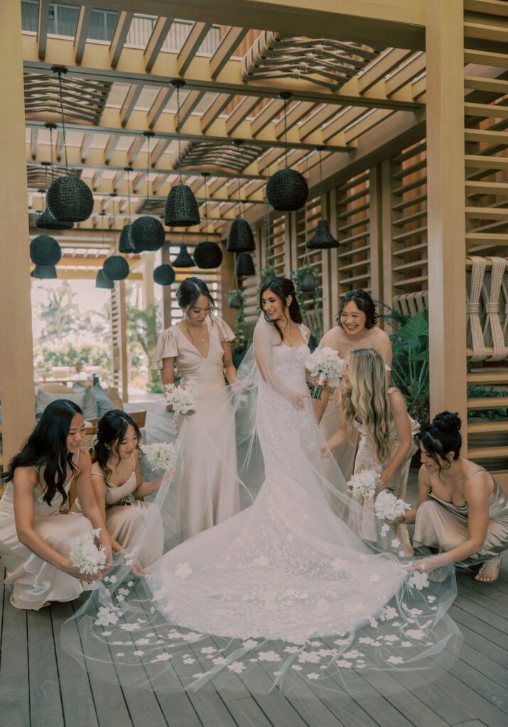 Bride in couture gown with five bridesmaids.