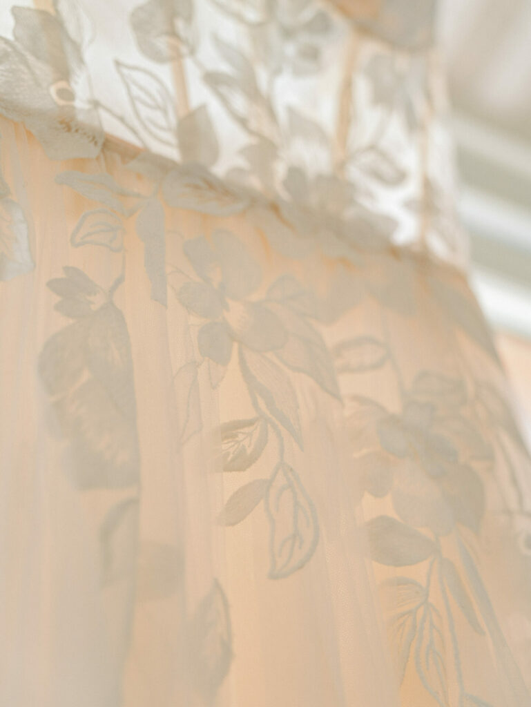 Sheer floral fabric detail from Mira Zwillinger gown.