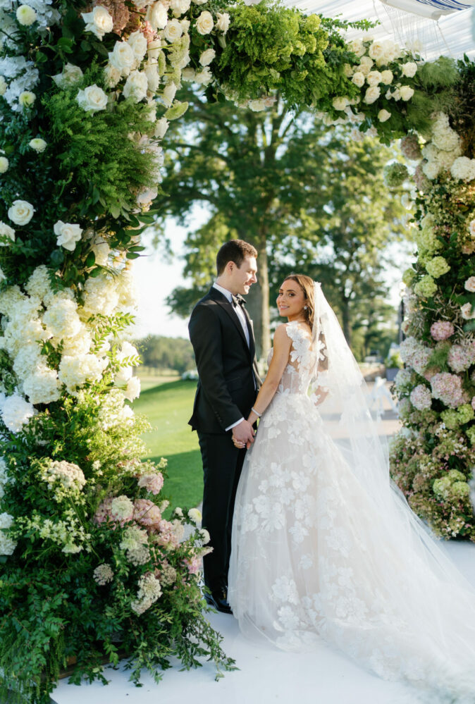 Sam Danielle Levin in Sunn gown with a custom strap and a matching veil