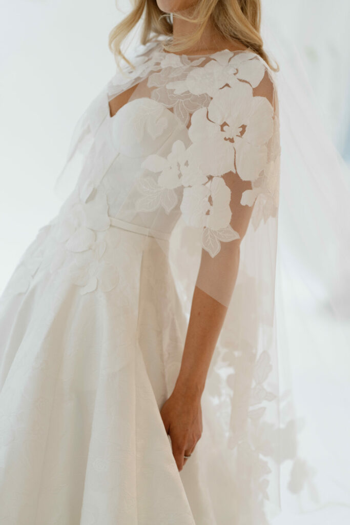 Bride in lace wedding dress from SS2026 "Far Beyond" collection.