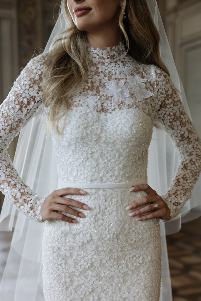 Bride Katya Ruiz in Mira Zwillinger Amy gown, smiling.