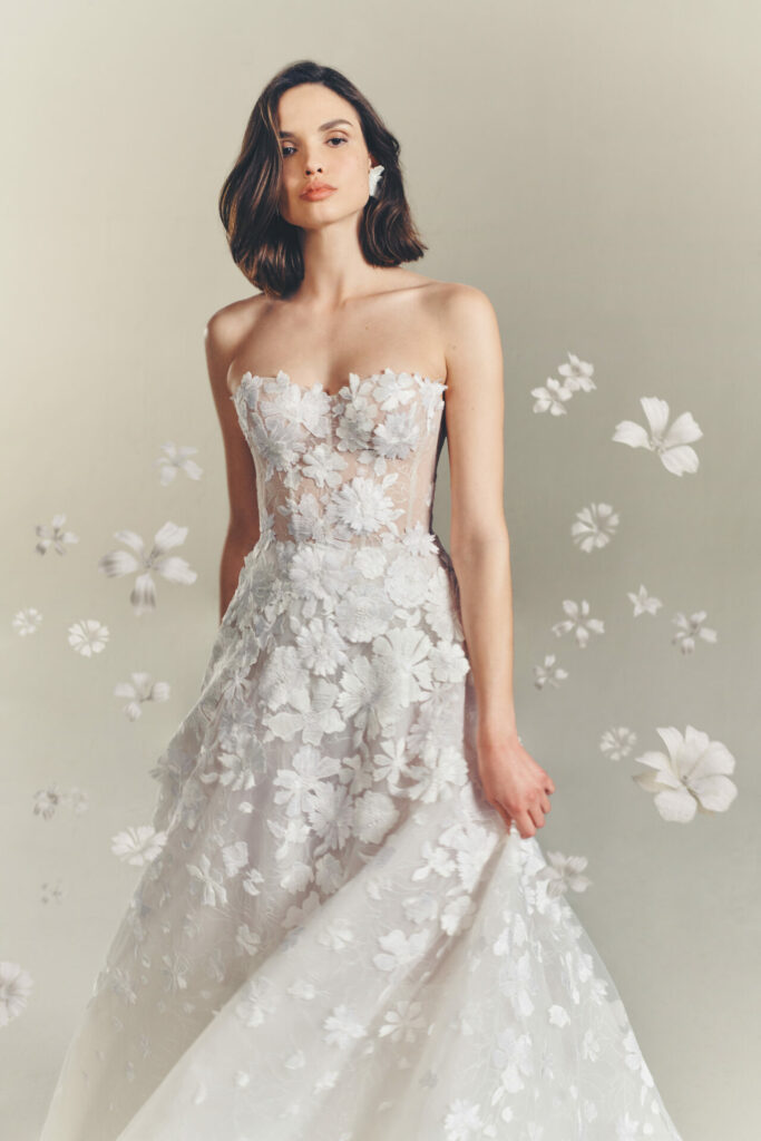 Woman in strapless floral wedding dress, 3D flowers floating.