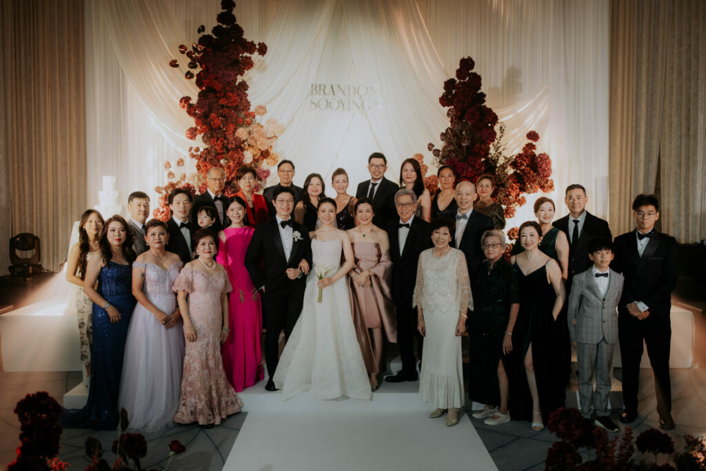 Katya Ruiz and groom center stage at elegant wedding.