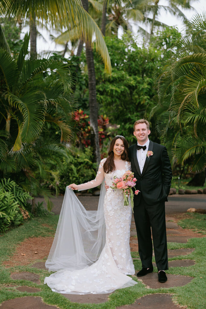 Taylor with her groom in the Ness wedding gown by Mira Zwillinger outdoors