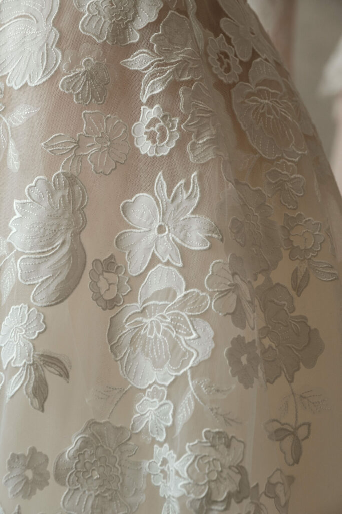 Sheer fabric with white floral embroidery, Ness & Nessia.
