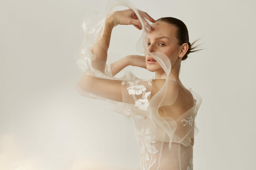 Editorial shot of the Elka gown by Mira Zwillinger showcasing sculptural volume and movement