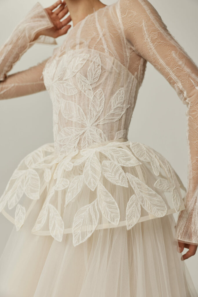 Ena leaf-embroidered corset with feather accents by Mira Zwillinger
