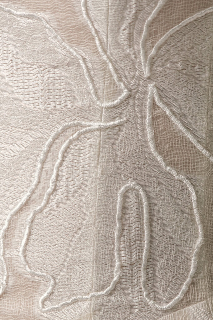 Sheer off-white Clea dress fabric, embroidered leaves.