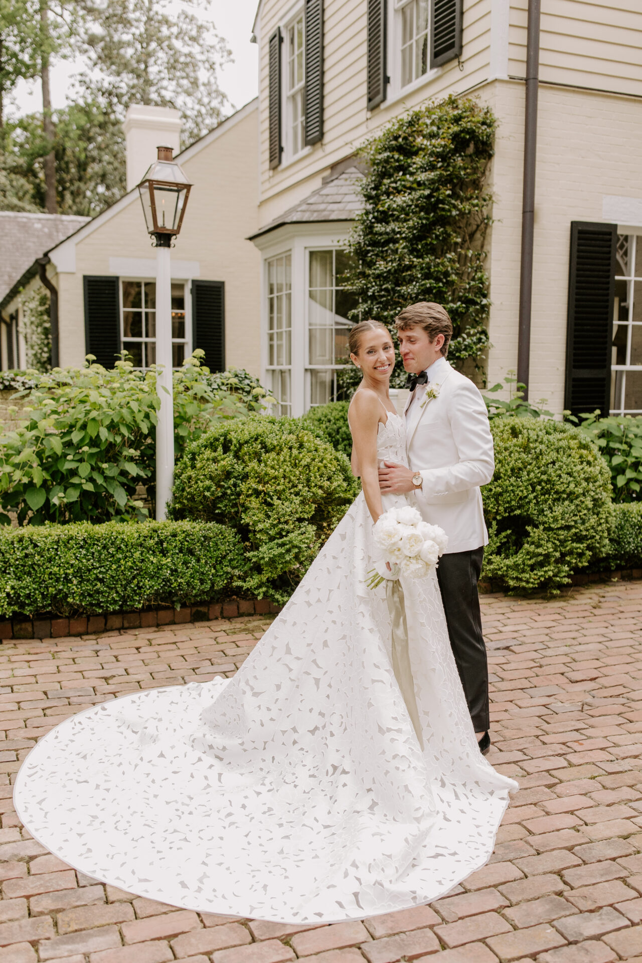 Detail of the Ayla wedding gown's sculpted fitted bodice by Mira Zwillinger