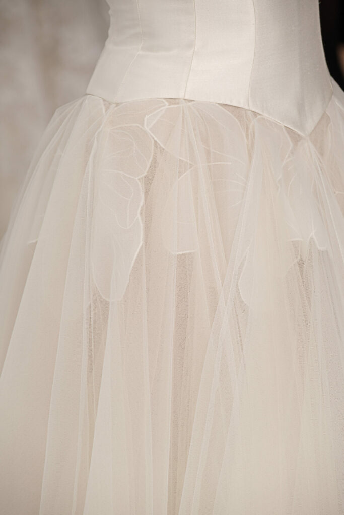 Clea wedding dress with satin bodice and tulle skirt.