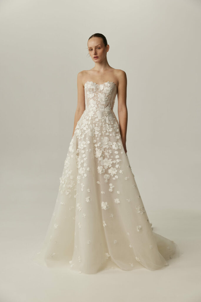 Bride in the strapless floral Alma wedding dress by Mira Zwillinger