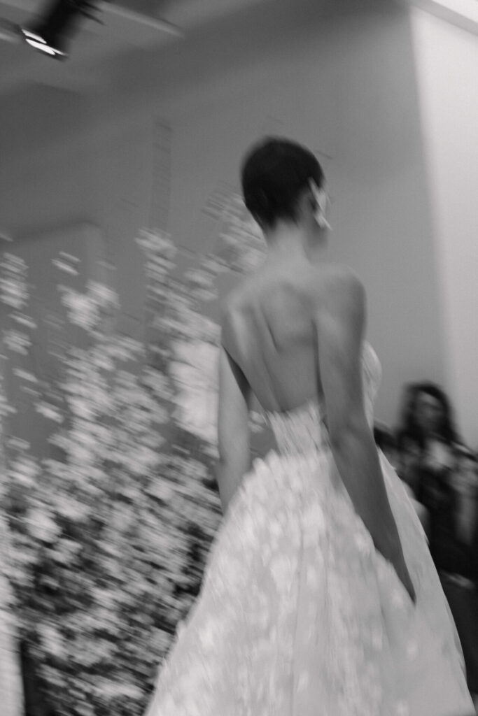 Bride in the Alma A-line wedding dress by Mira Zwillinger, back view