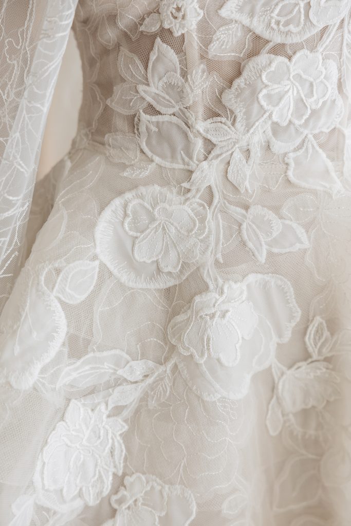 Detailed white lace wedding dress, Olivia Benjamin.